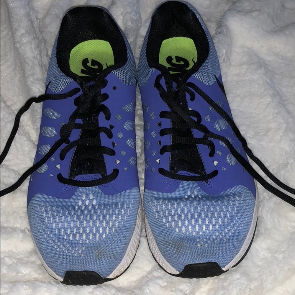 Purple Nike running shoes